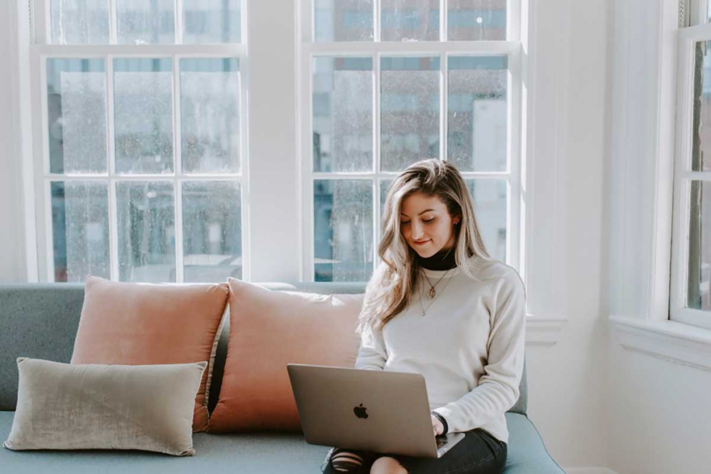 female fashion entrepreneur on her computer